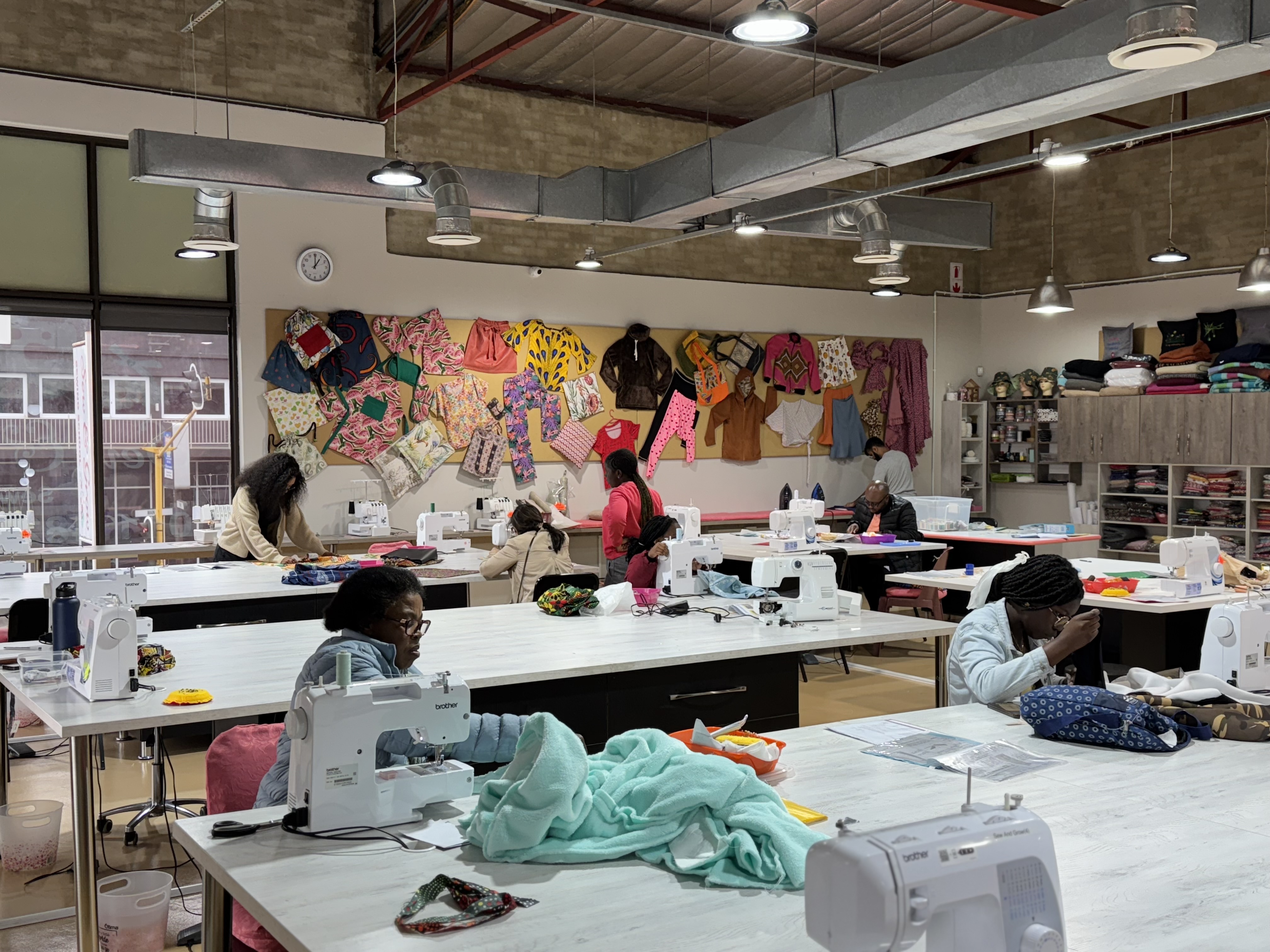 Students learning to sew at Sew and Grow studio