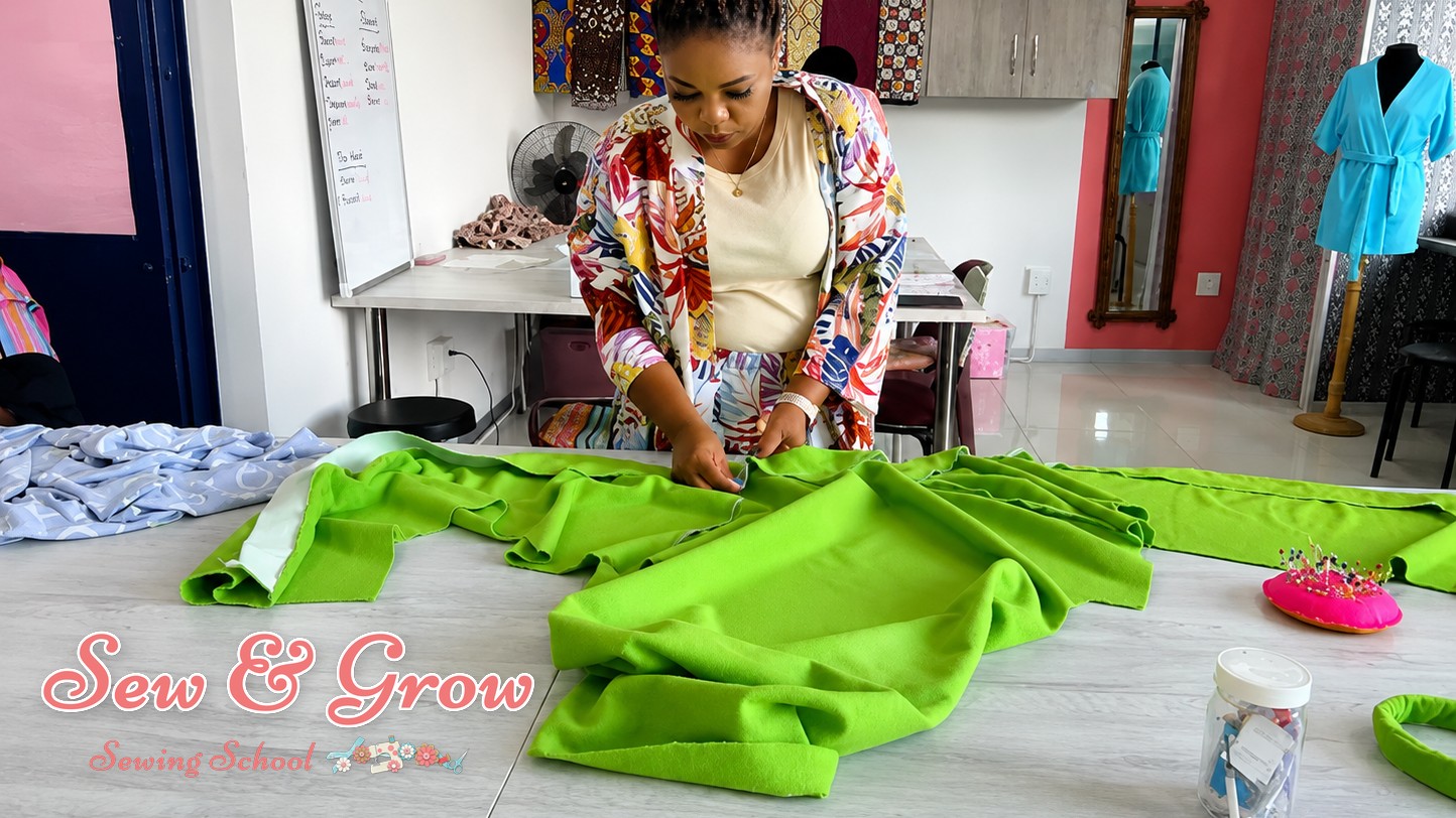 A student sewing confidently, all materials provided at their station