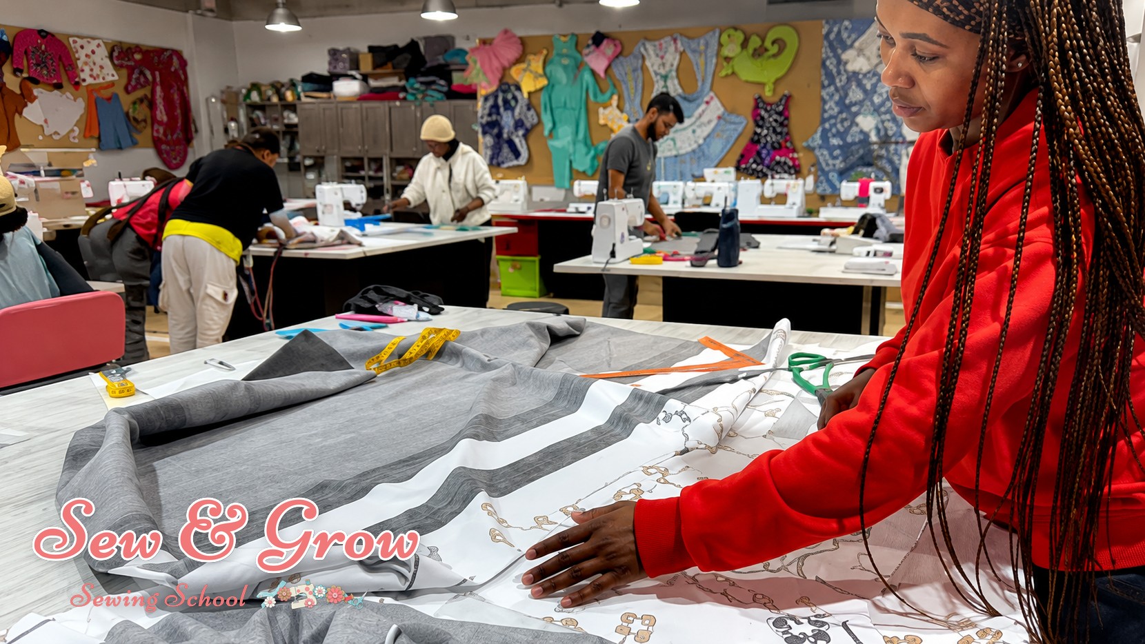 A student following an online lesson at their home sewing machine